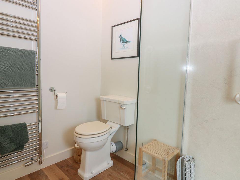 A bathroom with toilet and shower at Lower Lodge in Cupar