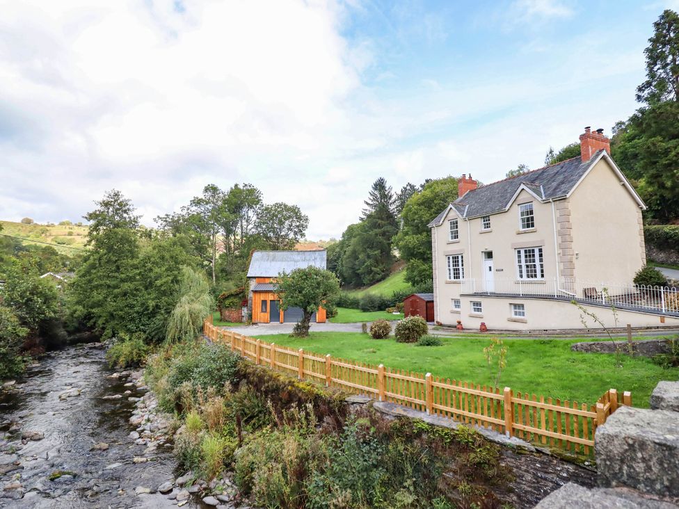 A house with a garden and stream at Dolhiryd in Glyn Ceiriog, near Chirk