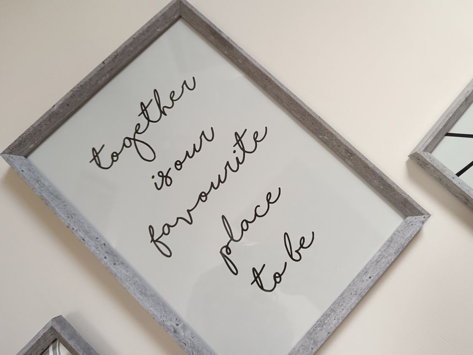 A framed wall art with text at 14 Lindon Street