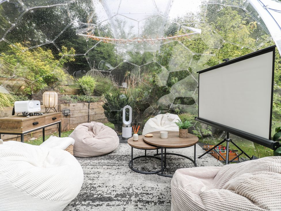 A bubble structure with bean bags and a coffee table at Rockcliffe Grange in Mansfield