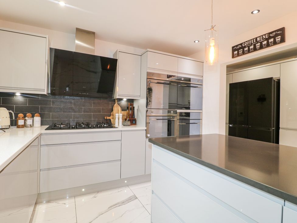 A kitchen with modern appliances at Rockcliffe Grange in Mansfield