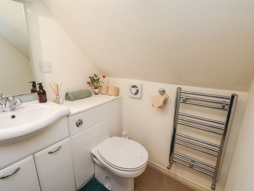 A bathroom with a sink and toilet at Woodbine Cottage in Whitby