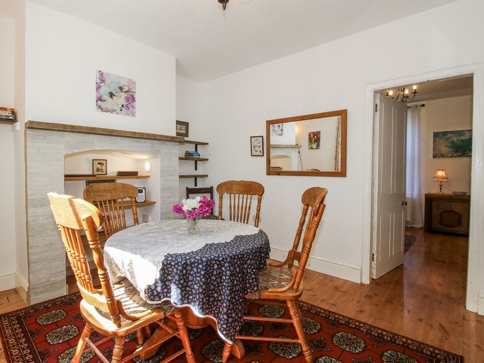 A dining room with a table and chairs at 157 Watling Street South, Church Stretton