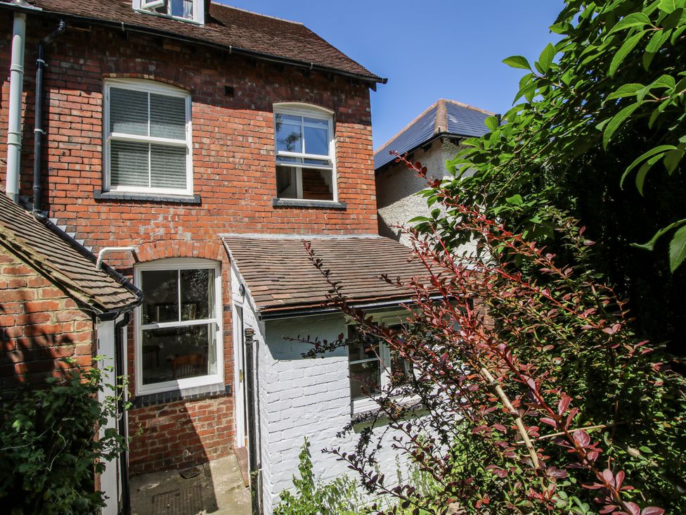 A brick house with windows and a garden at 157 Watling Street South Church Stretton