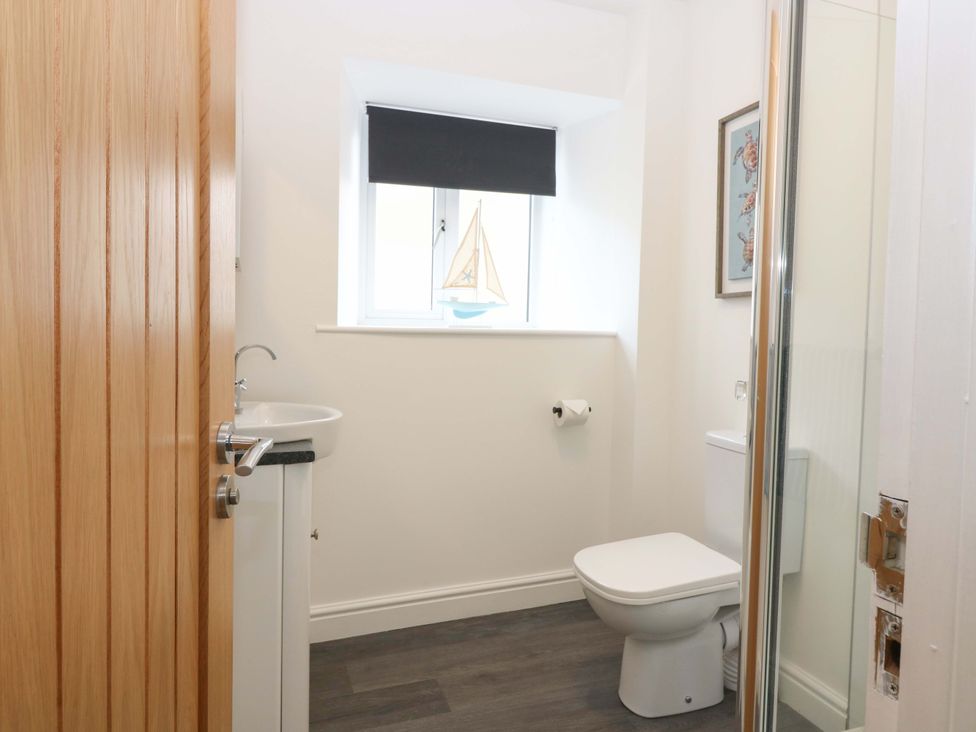 A bathroom with a sink and toilet at 3 Caroline Place in Fraserburgh