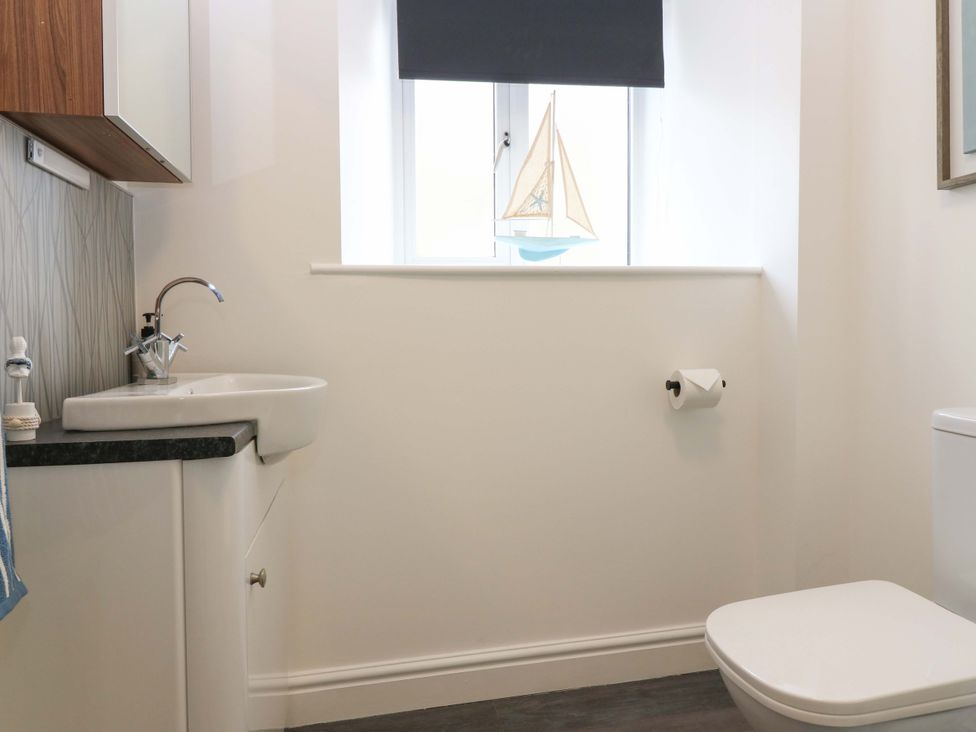 A bathroom with a sink and toilet at 3 Caroline Place in Fraserburgh