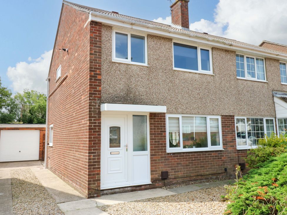 A house with a front door and windows at 8 Shearwater Way Blyth