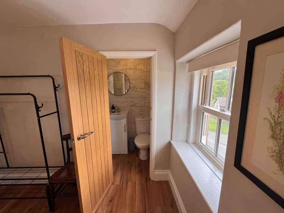 A bathroom with a sink and toilet at Old Station Cottage in Hexham