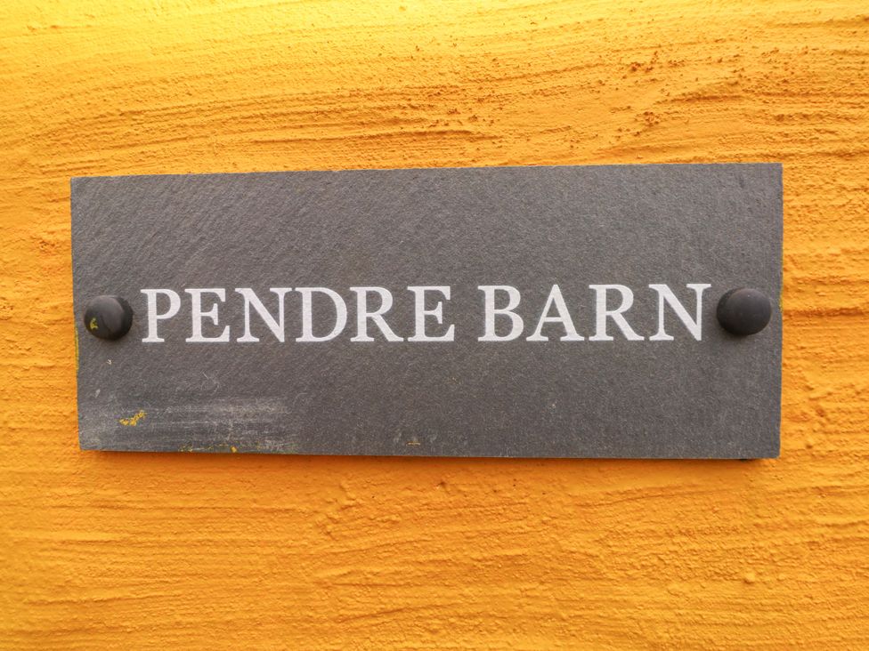 A sign displaying Pendre Barn