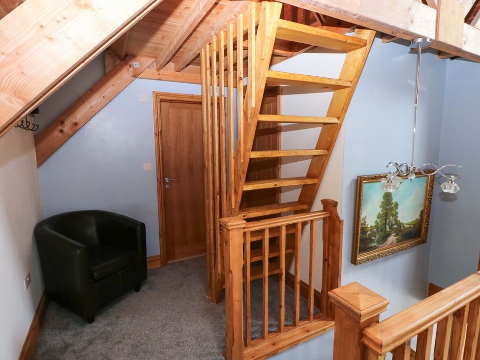 A staircase leading to an upper floor in Pendre Barn Star near Cenarth