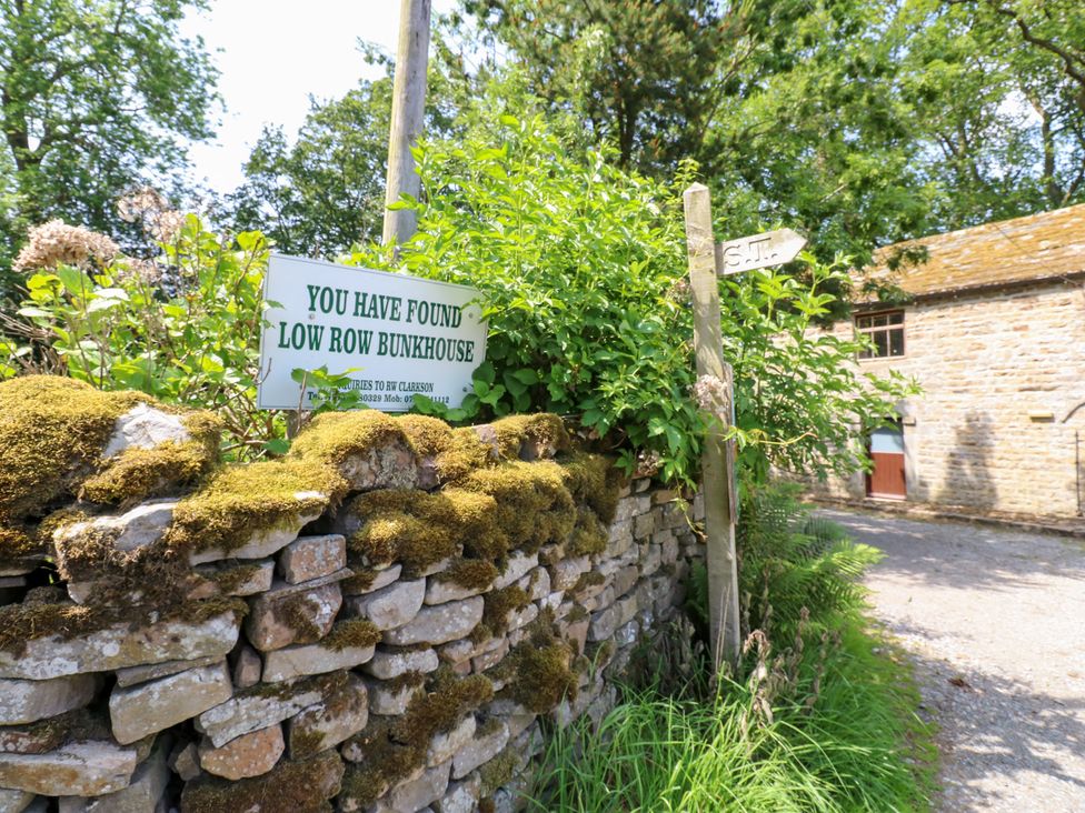 A sign indicating Low Row Bunkhouse at East Barn Bunkhouse