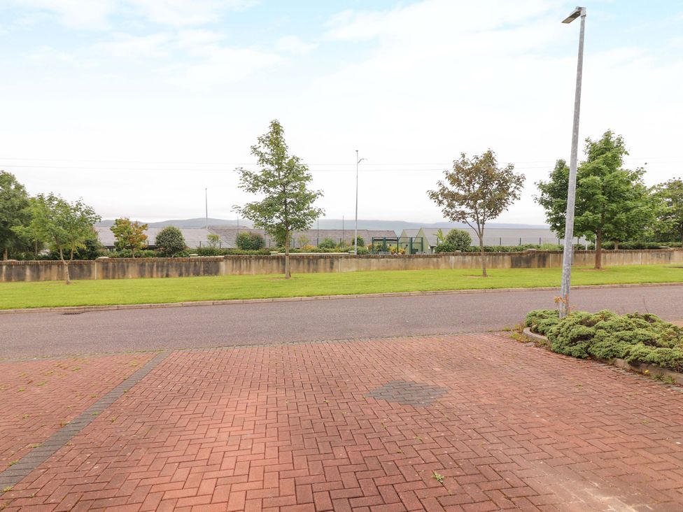 An outdoor area with a view of trees and grass at 51 Woodview Park, Tralee, County Kerry