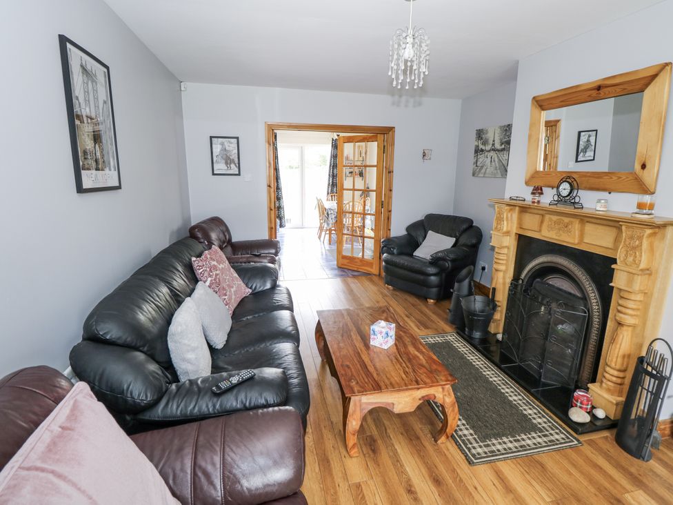 A living room with sofas and a coffee table at 22 White Maples in Bundoran, County Donegal