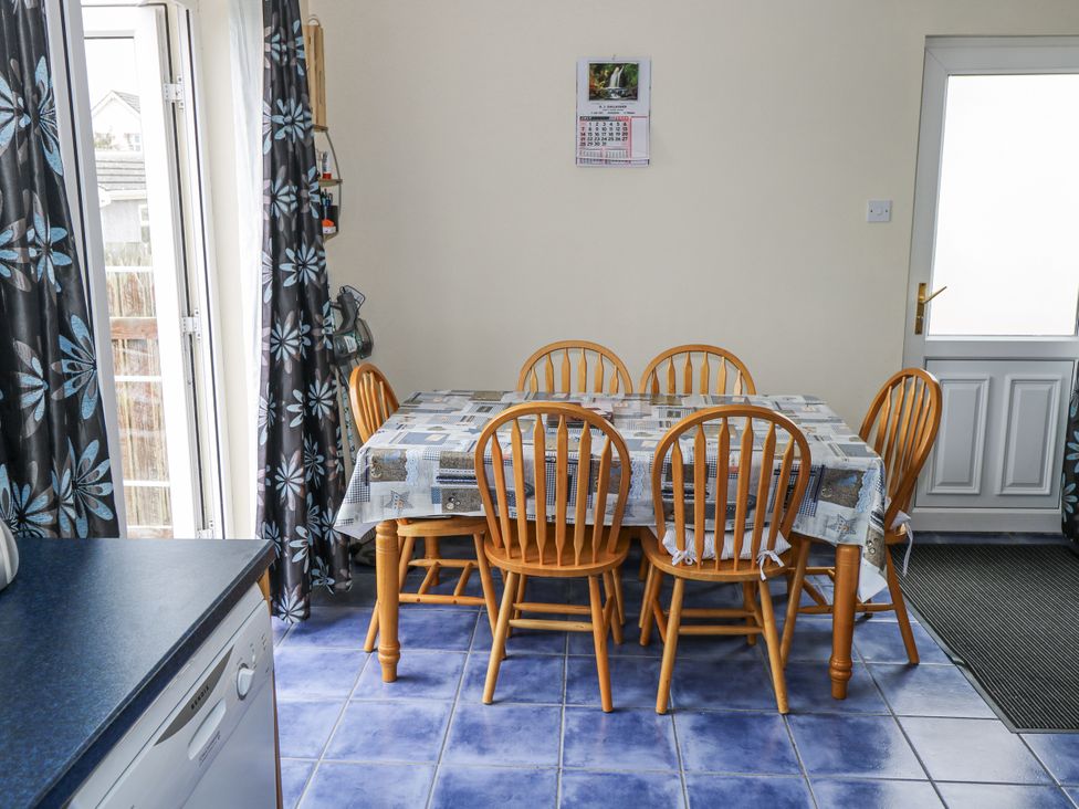 A dining room with a table and chairs at 22 White Maples, Bundoran, County Donegal