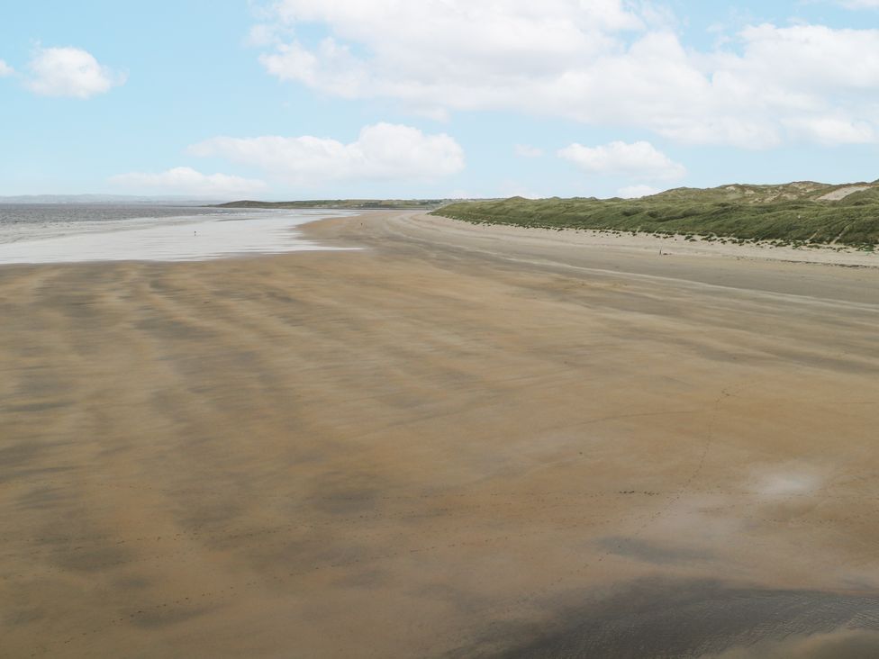 A beach with sand and water at 22 White Maples Bundoran, County Donegal