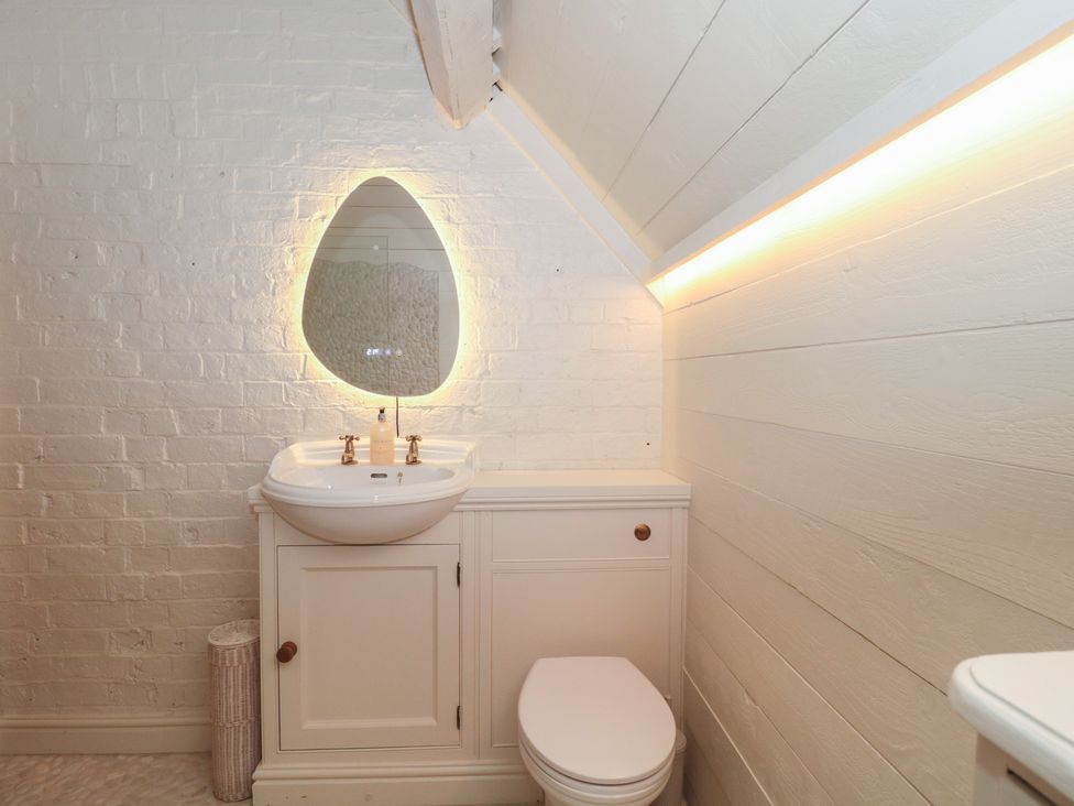 A bathroom with a sink and toilet at The Sty near Malmesbury
