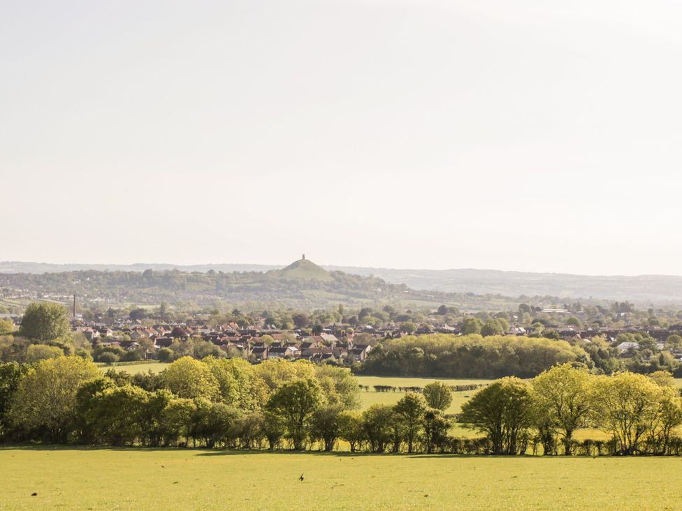 A landscape view with hills and trees at The Mill House in Glastonbury