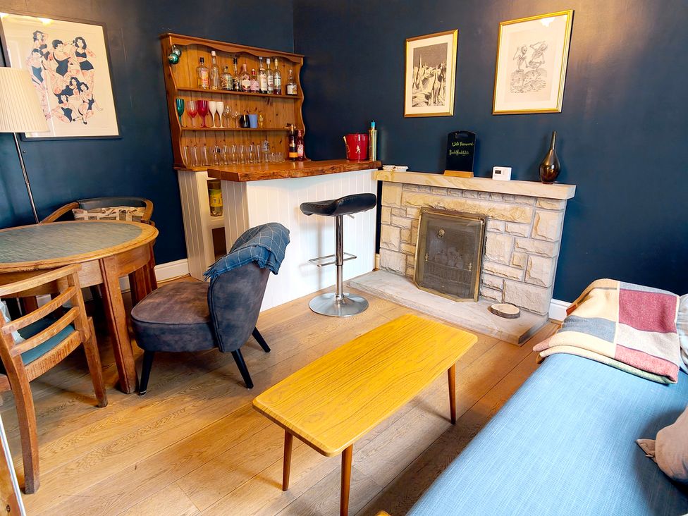 A snug with a bar and seating area at Bush Nook House in Brampton