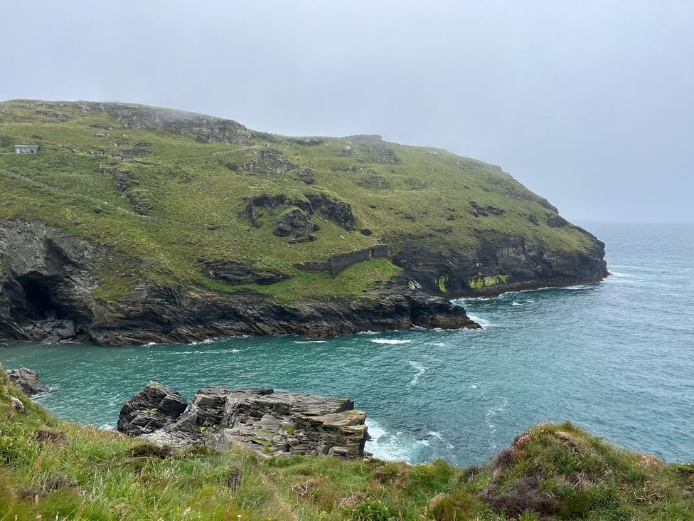 A coastal view with cliffs and sea at The Hideaway in Tintagel