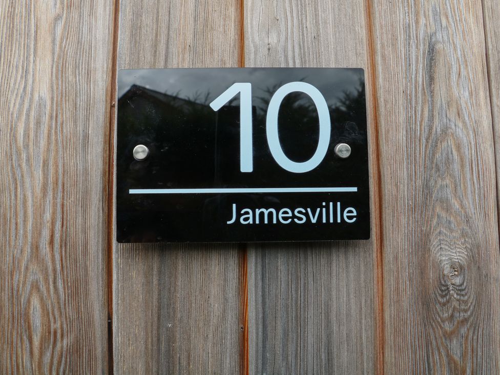 A nameplate displaying number 10 and Jamesville at James Ville Marina Lodge 10 in Brigg