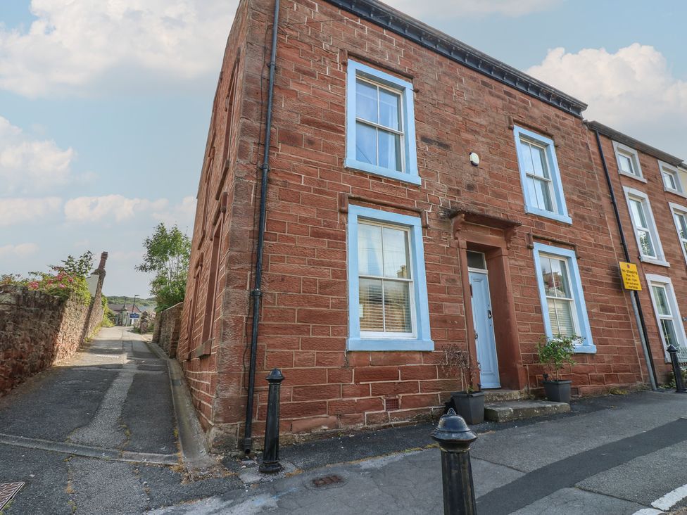 A building exterior with windows and a front door at Hampton House St. Bees
