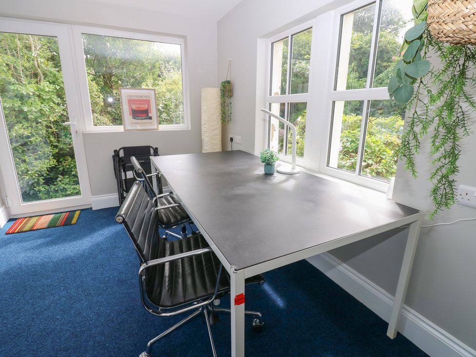 An office with a desk and chairs at Hampton House in St. Bees