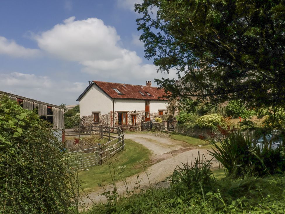 A house with a pathway and garden at Lane End in North Molton