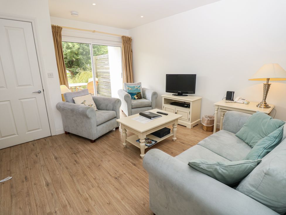 A living room with sofas and a television at Vermont 4 Yarmouth