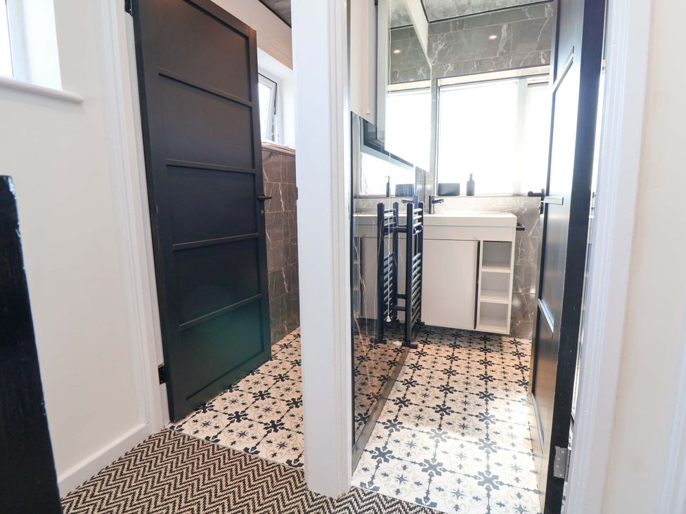 A bathroom with a vanity and sink at 11 Coniston Road Chester