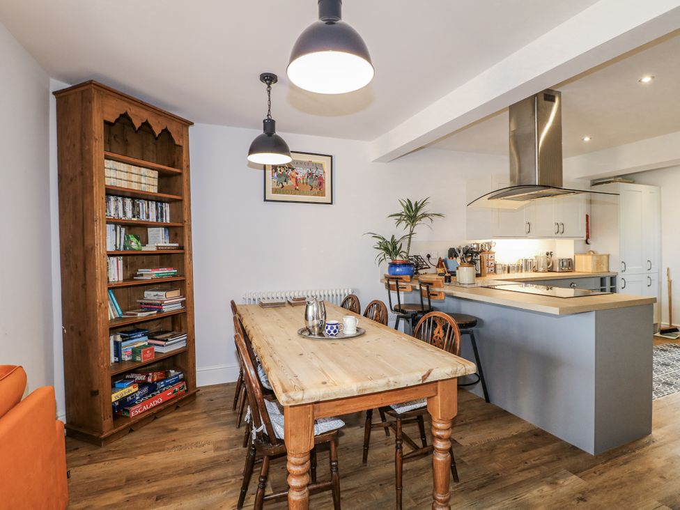 A dining room with a table and chairs at The View @ Orchard View Hognaston