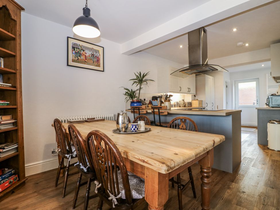 A dining room with a table and chairs at The View @ Orchard View Hognaston