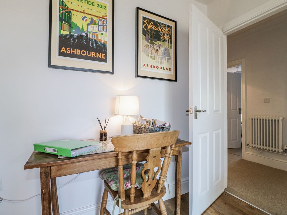 An office with a desk, chair, and lamp at The View @ Orchard View in Hognaston