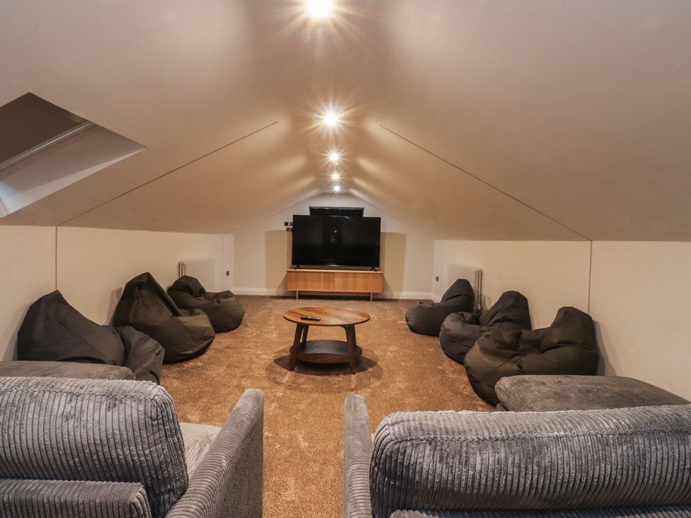 A snug with bean bags and a television at Alston House