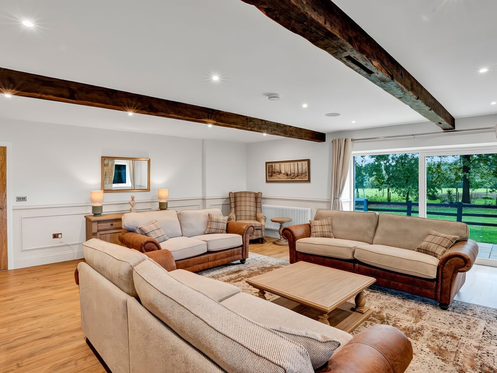 A living room with sofas and a coffee table at Alston House Longridge