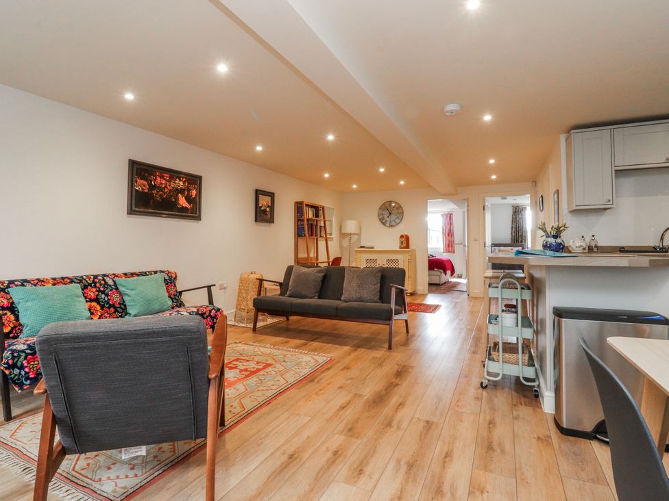 A living room with sofas and a coffee table at Number 7 Canalside in Skipton