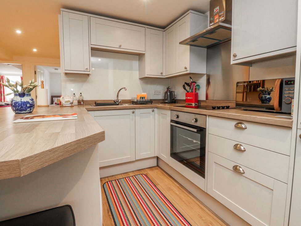 A kitchen with appliances and a worktop at Number 7 Canalside in Skipton