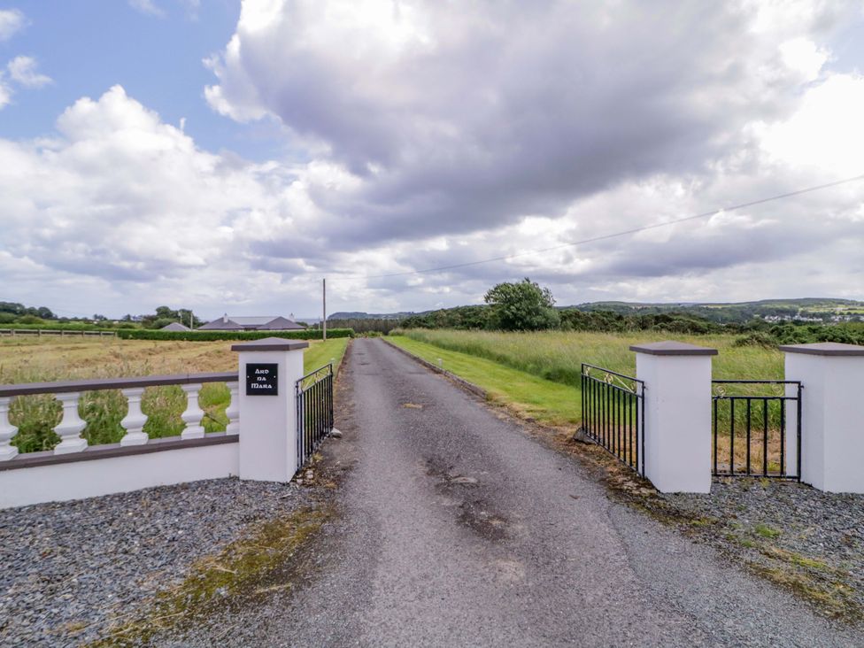 A pathway leading through a gate at Ard Na Mara