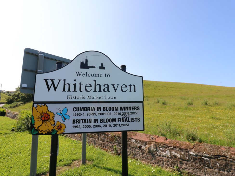 A welcome sign for Whitehaven historic market town in Whitehaven