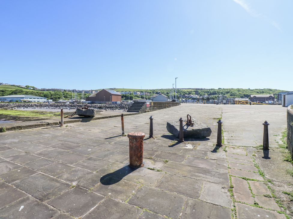 A pier with an anchor and mooring posts at Lowther House in Whitehaven