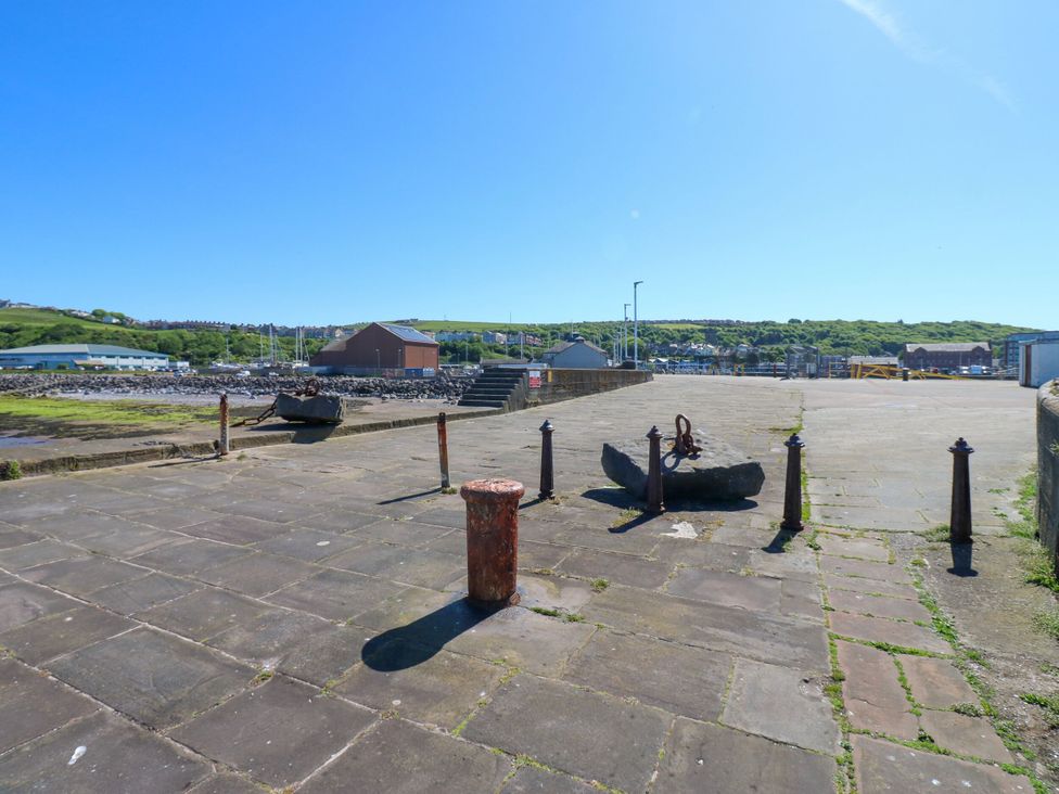 A pier with an anchor and bollards at Lowther Penthouse in Whitehaven