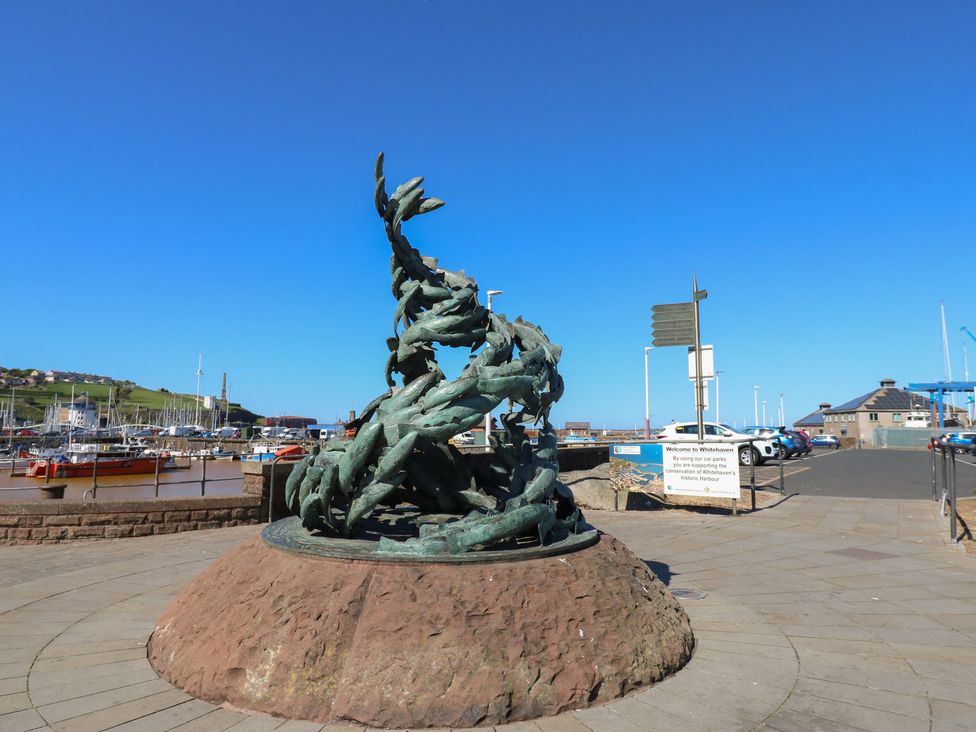 A sculpture near a harbor in Whitehaven