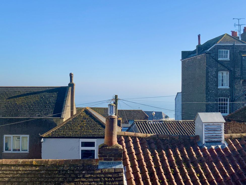 A view of rooftops and a clear sky at Corner View in Broadstairs