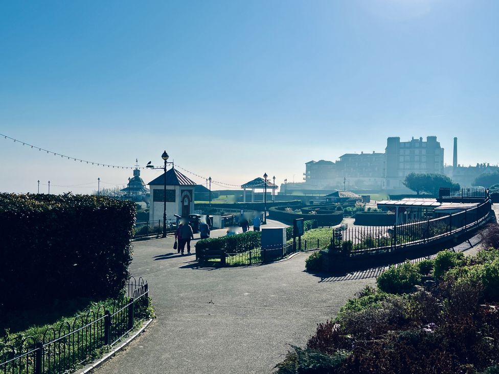 A park with a path and greenery at Corner View in Broadstairs