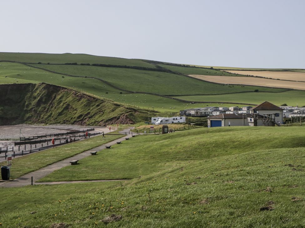 A beach area with grass and pathways at Puffin in St Bees