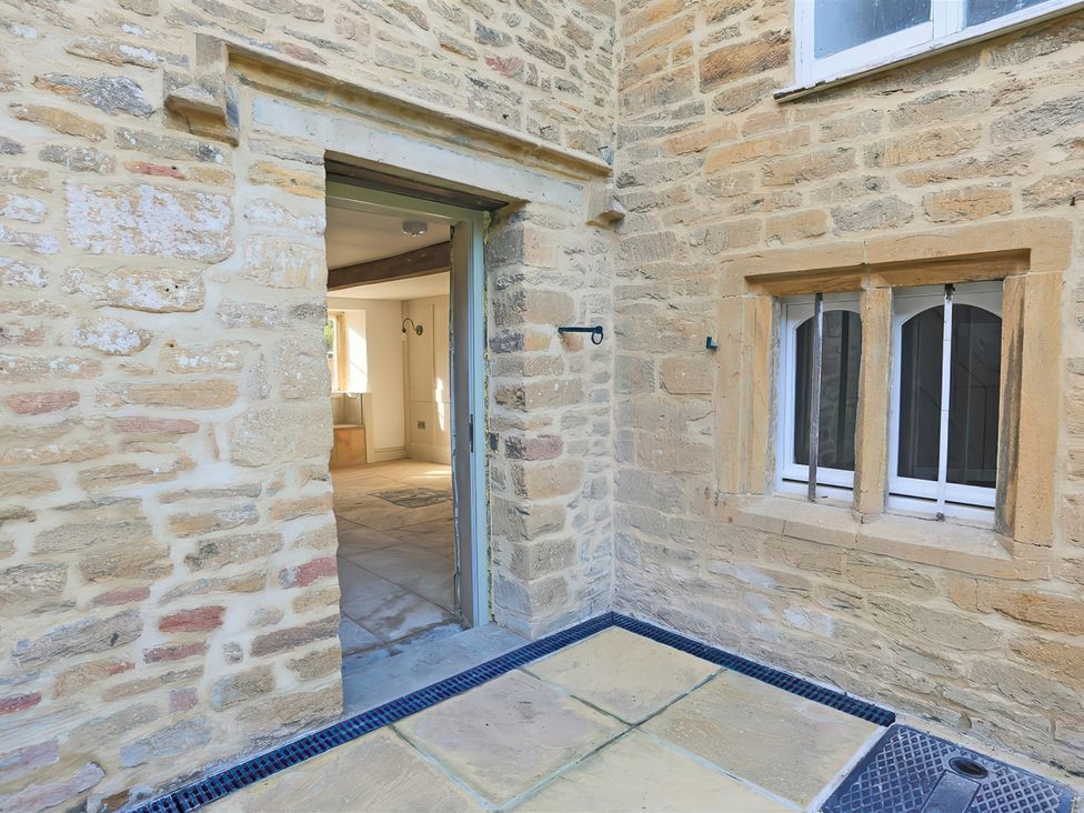 A doorway leading into a room with a stone wall at 46 North Street Stoke-Sub-Hamdon Somerset