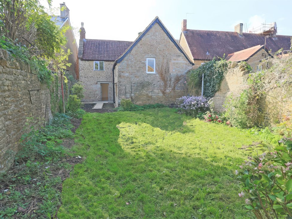 A garden with grass and plants at 46 North Street Stoke-Sub-Hamdon Somerset