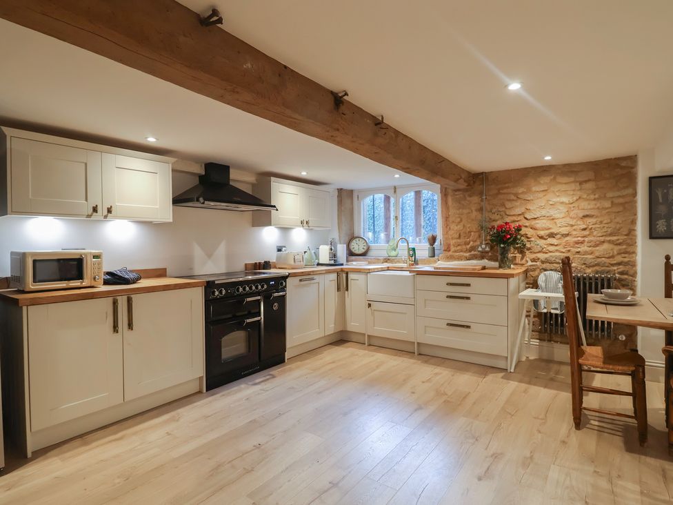 A kitchen with wooden countertops and appliances at 46 North Street Stoke-Sub-Hamdon, Somerset