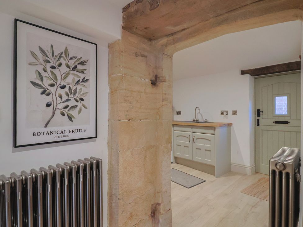 A kitchen with a sink and cabinet at 46 North Street Stoke-Sub-Hamdon Somerset