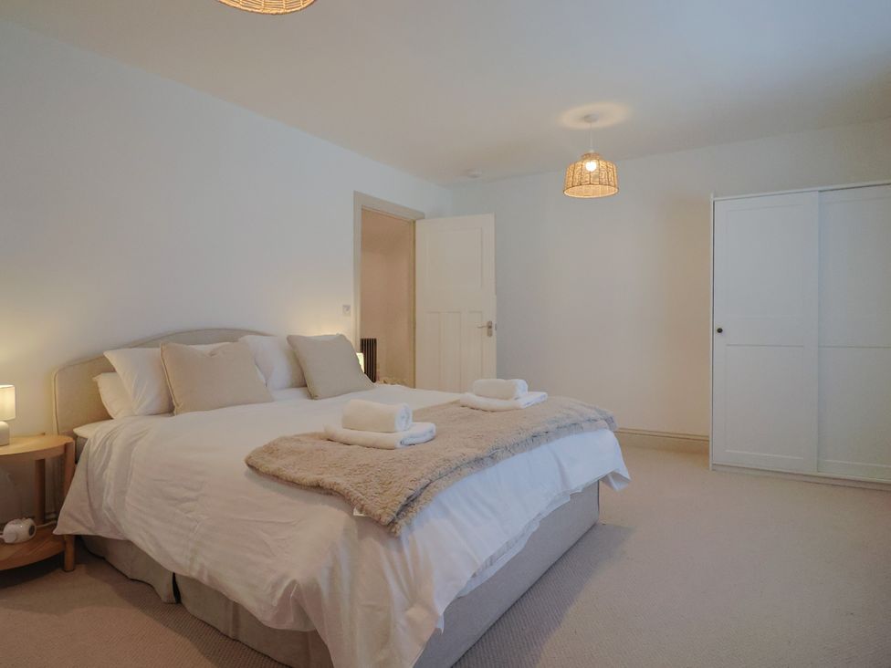 A bedroom with a bed and bedside table at 46 North Street Stoke-Sub-Hamdon Somerset