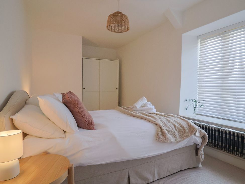 A bedroom with a bed and bedside table at 46 North Street Stoke-Sub-Hamdon Somerset